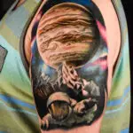 Color realism astronaut tattoo by All City Tattoo Delray Beach