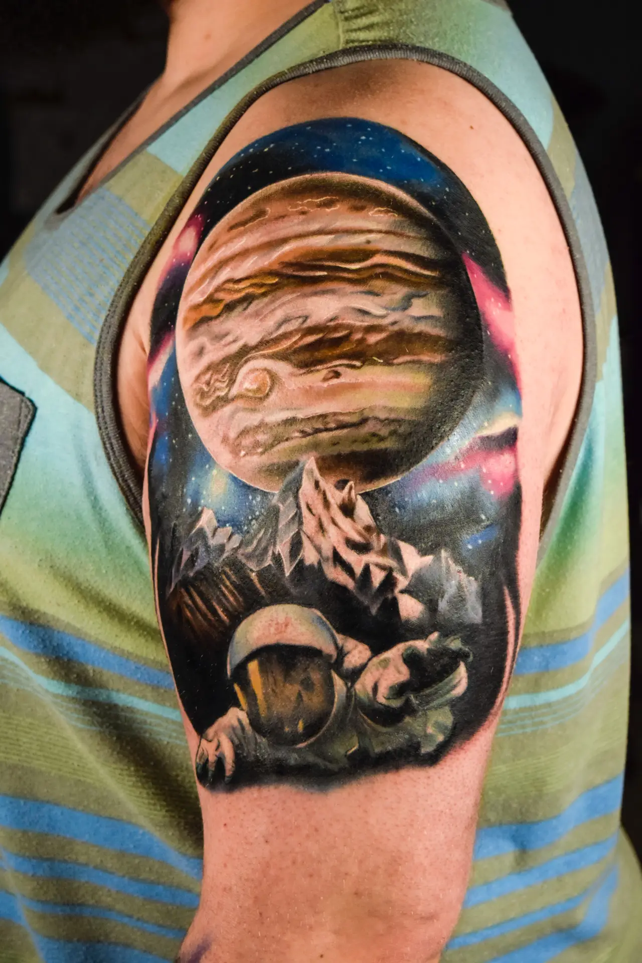 Color realism astronaut tattoo by All City Tattoo Delray Beach