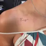 Minimalist fine line tattoo by an All City Tattoo artist