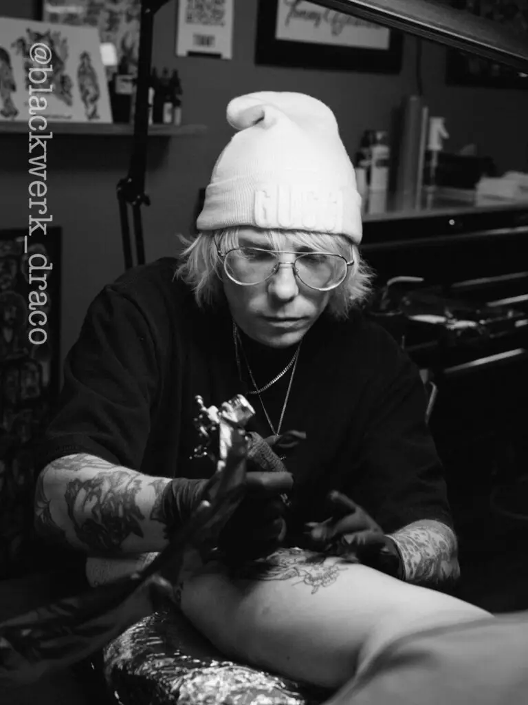Portrait of tattoo artist Draco working at All City Tattoo Company in Delray Beach